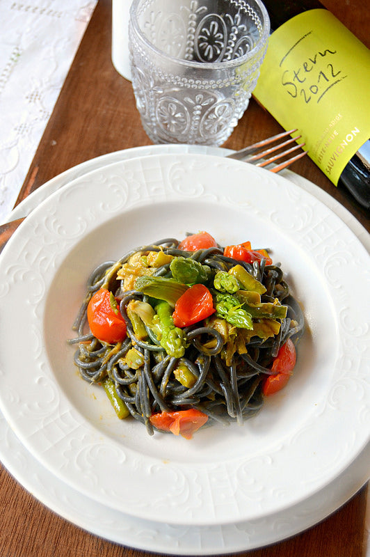 Black spaghetti Marinara with cuttlefish ink, salted capers and sweet paprika