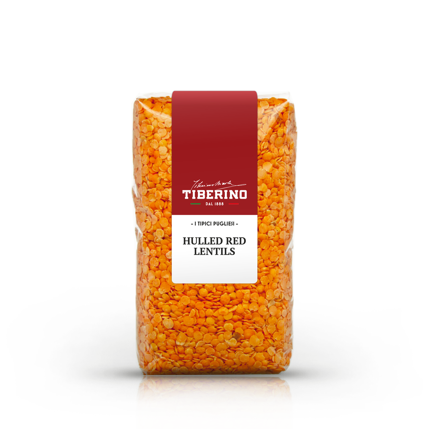 Sacchetto trasparente di lenticchie rosse decorticate Tiberino 1888 con etichetta rossa e bianca.