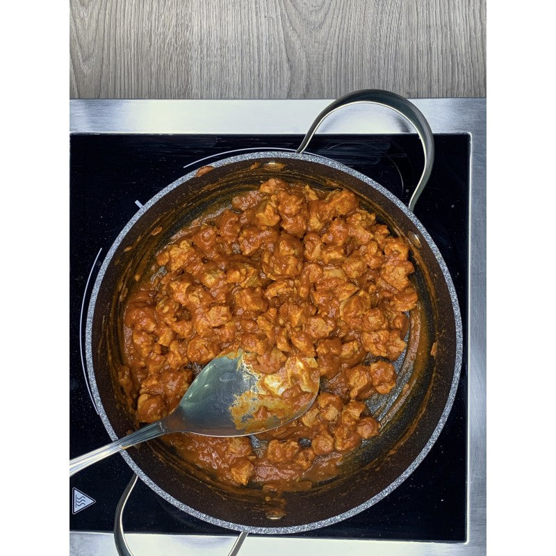 Vegan goulash with soya chunks deeped in sweet smoked paprika sauce
