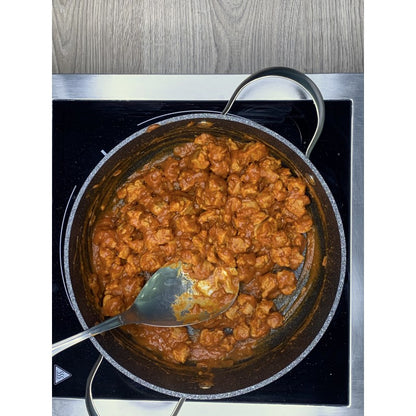 Vegan goulash with soya chunks deeped in sweet smoked paprika sauce