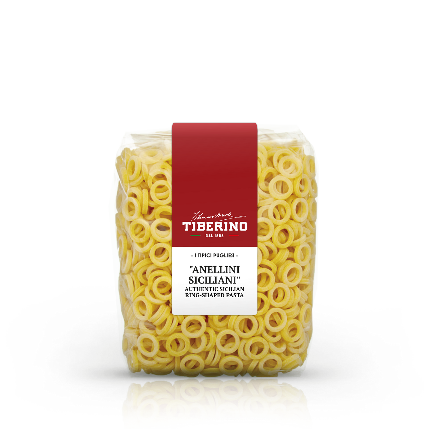 Confezione trasparente di pasta Anellini Siciliani Tiberino 1888, con etichetta rossa e testo bianco.