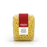 Confezione trasparente di pasta Anellini Siciliani Tiberino 1888, pasta di semola di grano duro, con etichetta rossa e bianca.