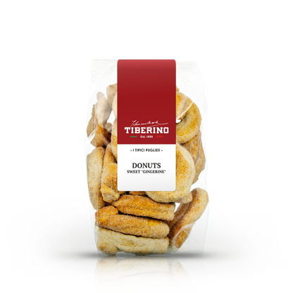 Confezione trasparente di ciambelle dolci Gingerine Tiberino 1888, etichetta rossa e bianca, 200g.