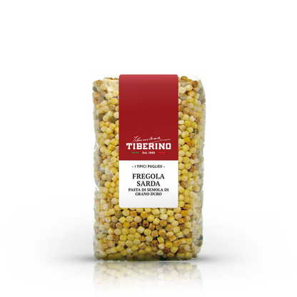 Confezione trasparente di Fregola Sarda Tiberino 1888, pasta di semola di grano duro, con etichetta rossa e bianca.