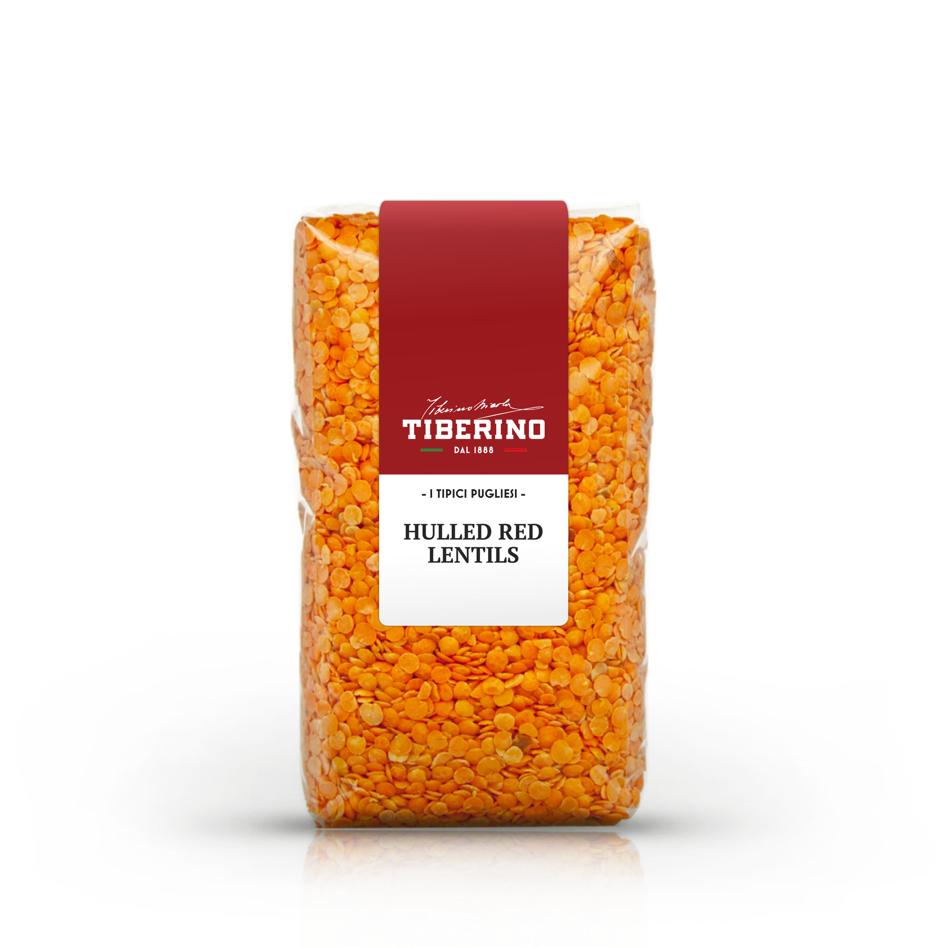 Sacchetto trasparente di lenticchie rosse decorticate Tiberino 1888 con etichetta rossa e bianca.