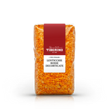 Sacchetto trasparente di lenticchie rosse decorticate Tiberino 1888 con etichetta rossa e bianca.