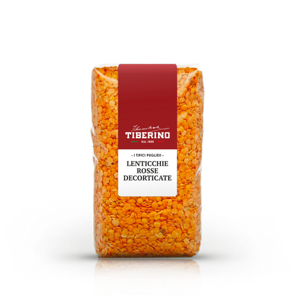 Sacchetto trasparente di lenticchie rosse decorticate Tiberino 1888 con etichetta rossa e bianca.