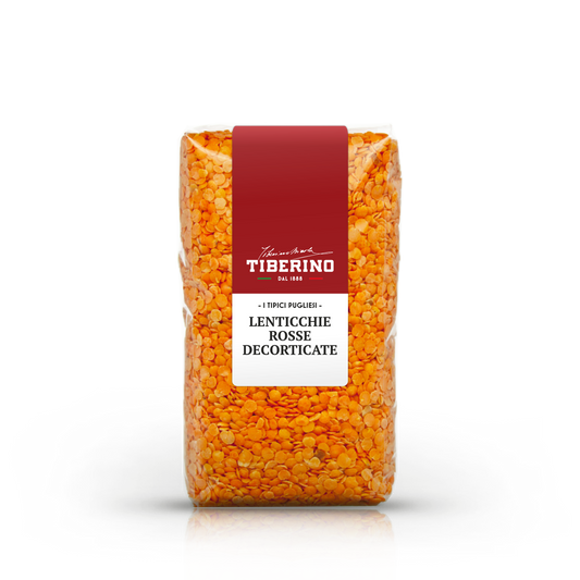 Sacchetto trasparente di lenticchie rosse decorticate Tiberino 1888 con etichetta rossa e bianca.