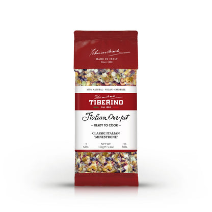 Busta rossa opaca di Minestrone Tiberino 1888 con ingredienti visibili, etichetta bianca e testo nero.