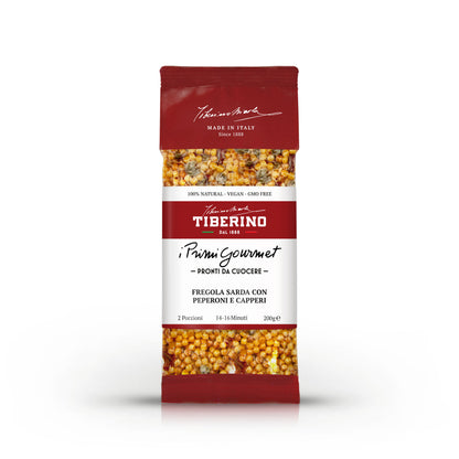 Confezione rossa di pasta Tiberino 1888 Fregola Sarda con Peperoni e Capperi, 200g, con finestra trasparente che mostra la pasta.