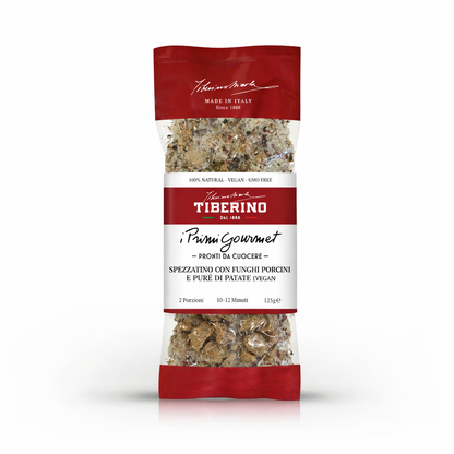 Confezione trasparente e rossa di Spezzatino con funghi porcini e purè di patate vegan Tiberino 1888, 125g.