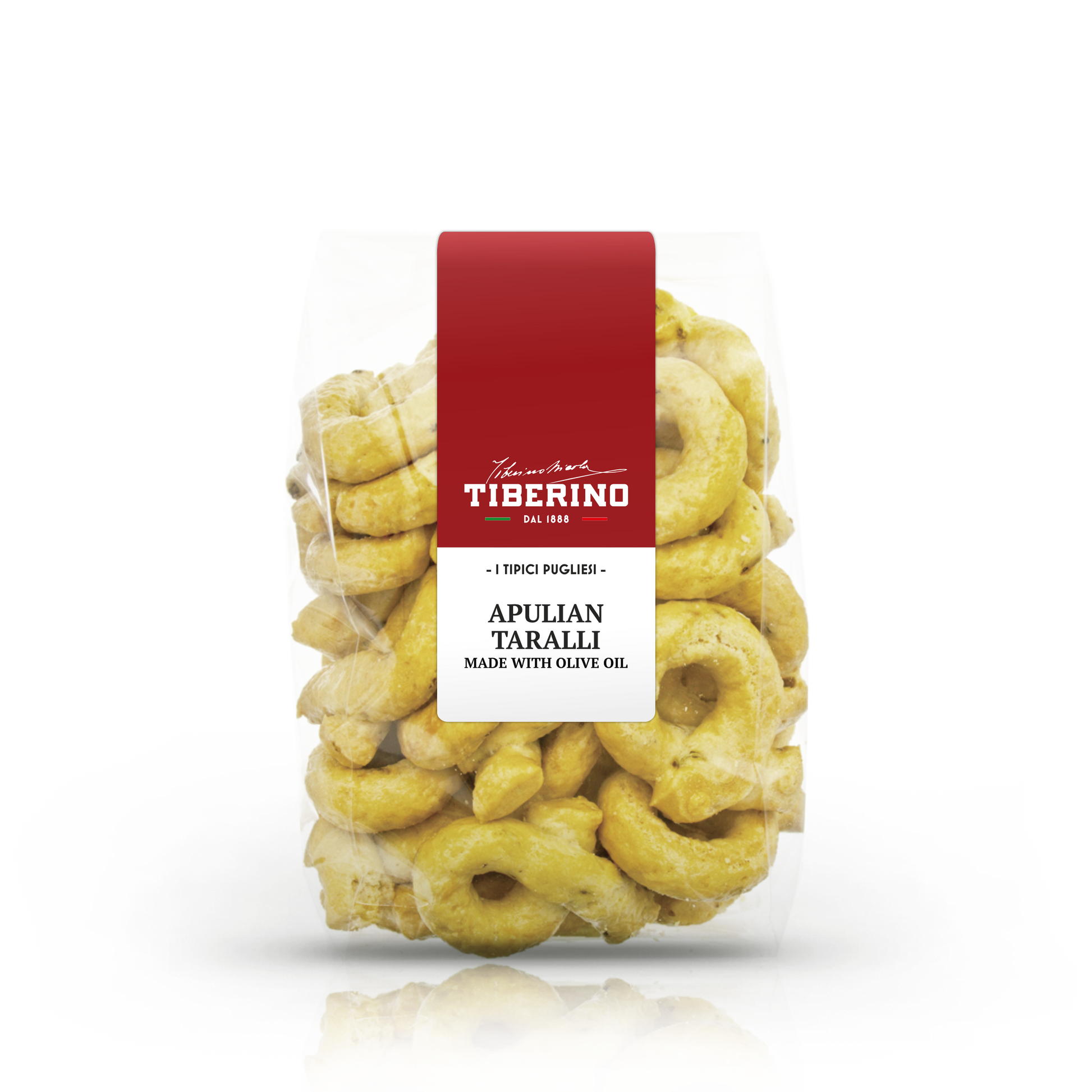 Confezione trasparente di Taralli Pugliesi Tiberino 1888, anelli dorati con etichetta rossa e bianca.