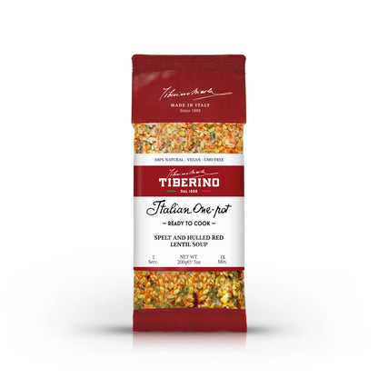 Confezione rossa Tiberino 1888 di zuppa di farro e lenticchie rosse, con ingredienti visibili e etichetta bianca.