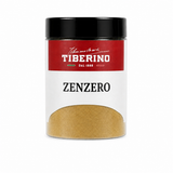 Barattolo trasparente con coperchio nero e etichetta rossa Tiberino 1888, contenente zenzero in polvere beige chiaro.