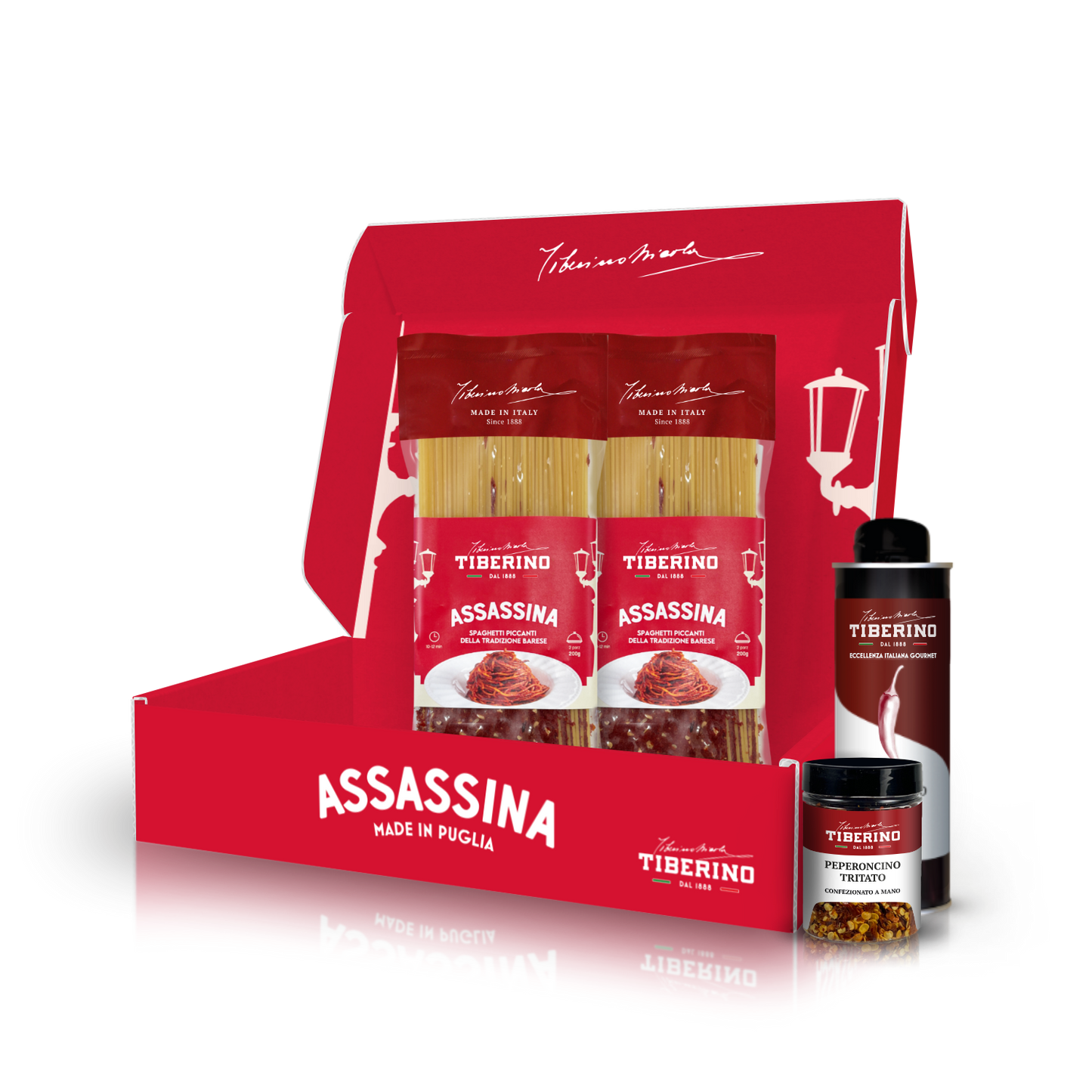 Cofanetto rosso L'Assassina Gourmet BOX con due confezioni di spaghetti Tiberino 1888, olio al peperoncino e peperoncino tritato.