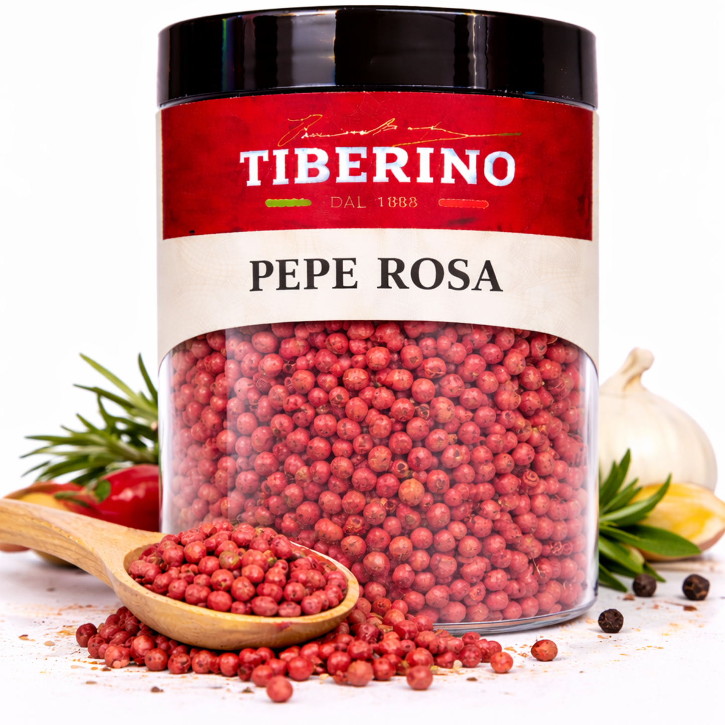 Barattolo trasparente Tiberino 1888 di Pepe Rosa da 20g con etichetta rossa, cucchiaio di legno e spezie.