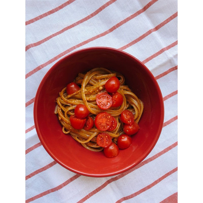 Spaghetti alla Caprese with salted capers and smoked paprika