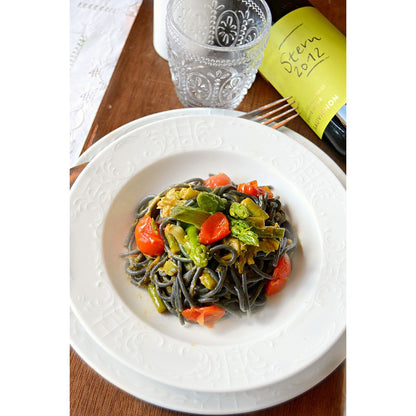 Black spaghetti Marinara with cuttlefish ink, salted capers and sweet paprika 